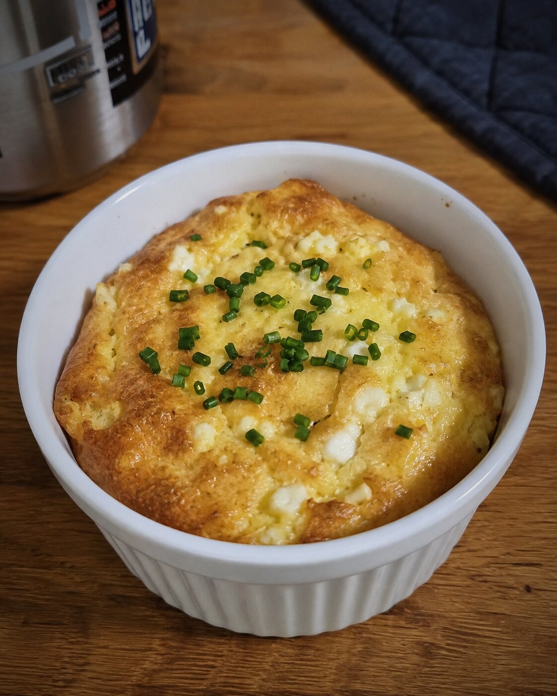 Small ramekin of cottage-cheese egg bake with chives